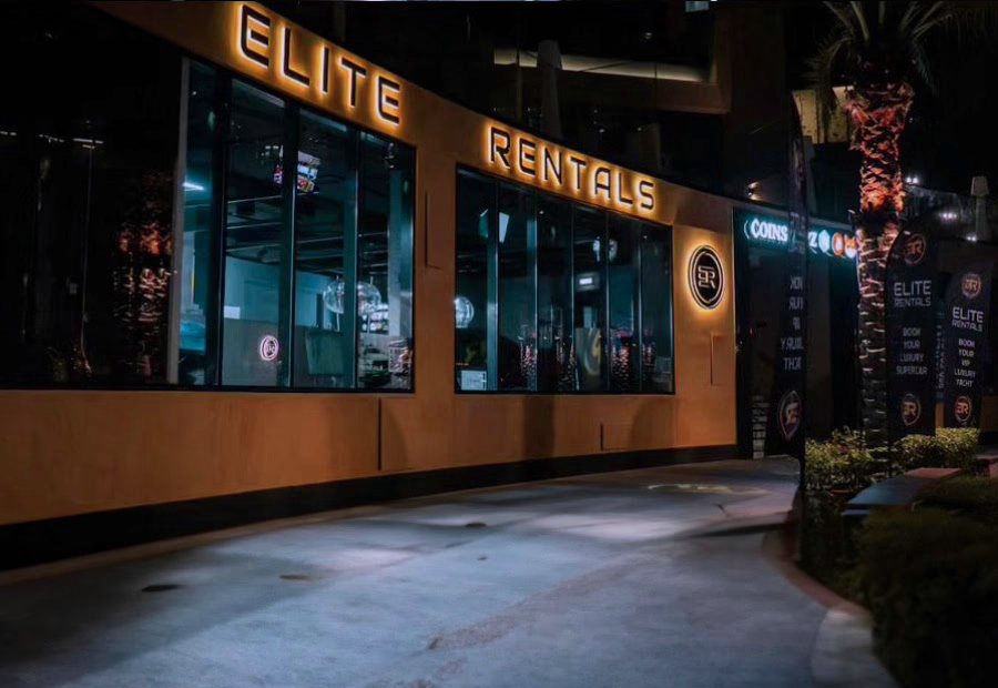 Elite Rentals showroom at night, Dubai Marina